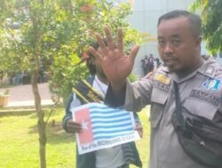Papuan Students escorted off campus area for holding Morning Star poster at Mataram University
